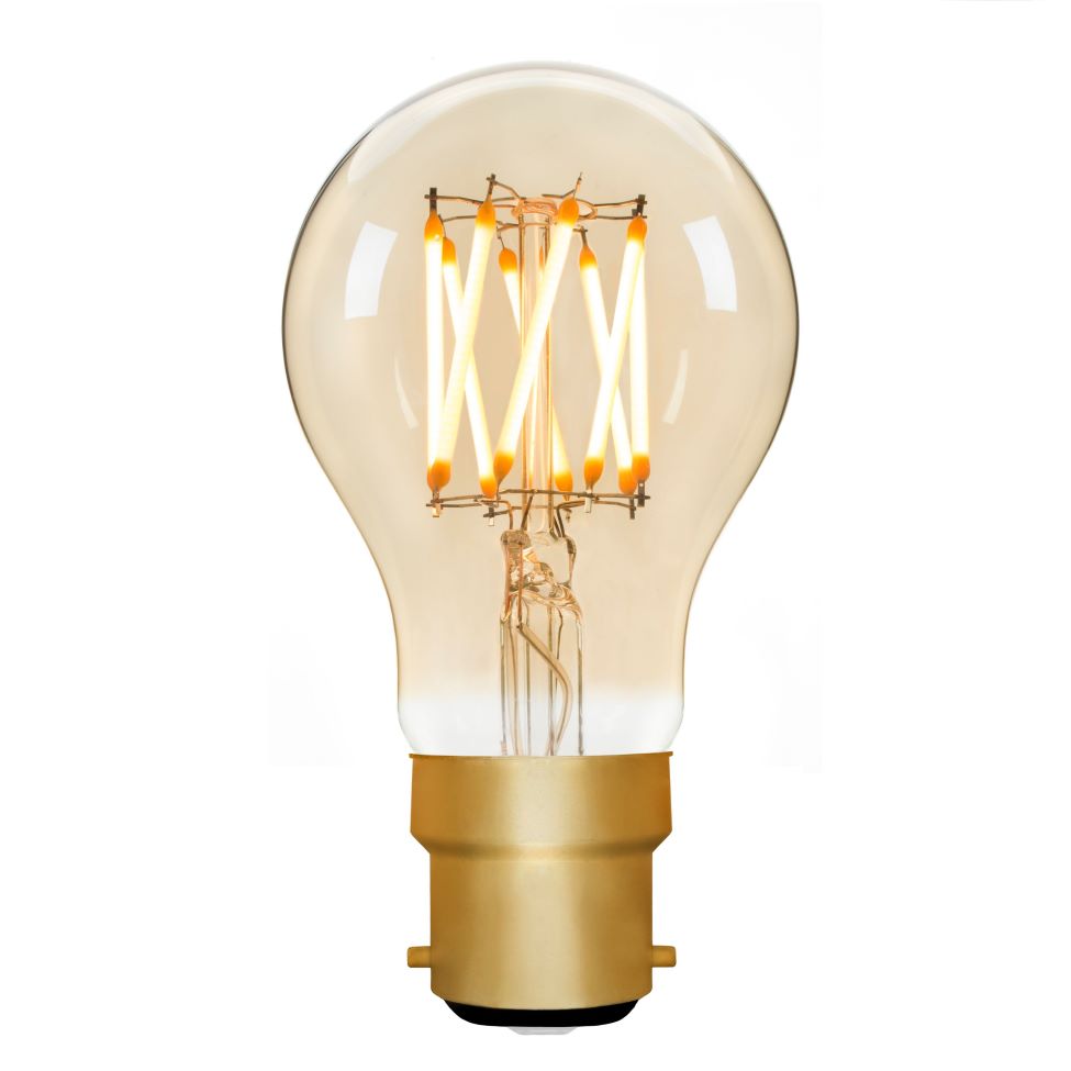 Vintage-style light bulb with clear glass and gold base on a white background